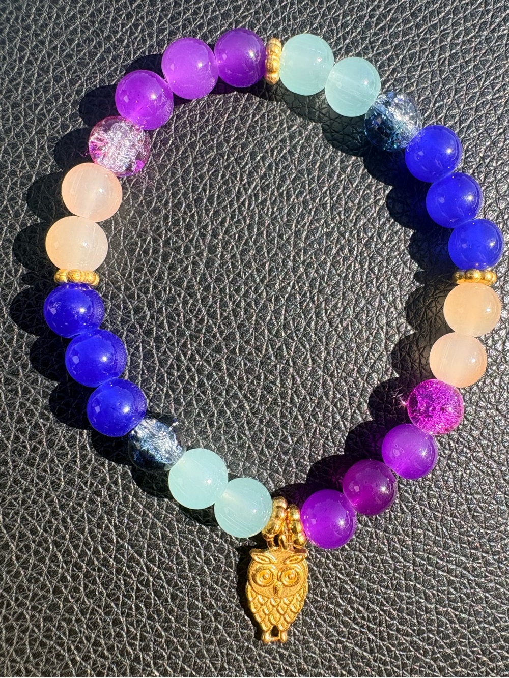 Blues and purple glasses beaded bracket with gold accent and owl charm
